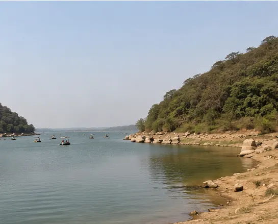 Peaceful Damdama Lake Gurgaon surrounded by Aravalli Hills with boating and natural scenery
